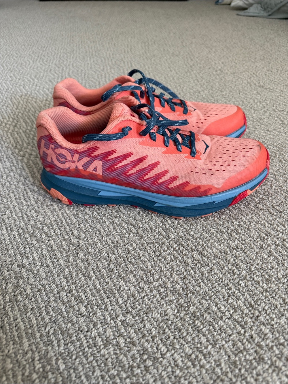 Hoka Womenβs Coral Pink and Navy Trail Running Shoes